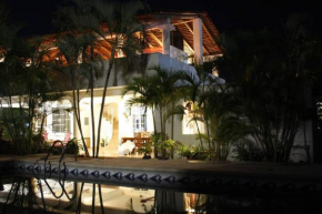 Lush Garden House near beaches with private pool.